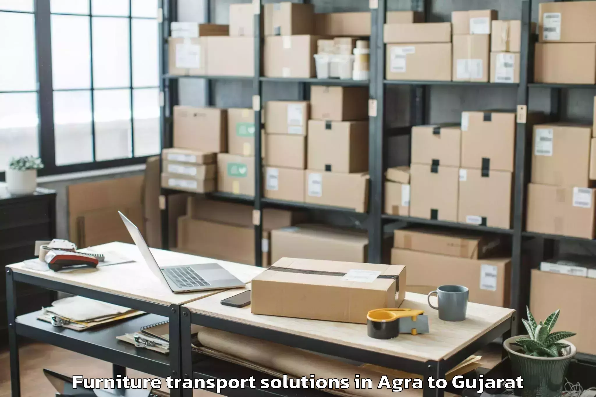 Top Agra to Lunawada Furniture Transport Solutions Available